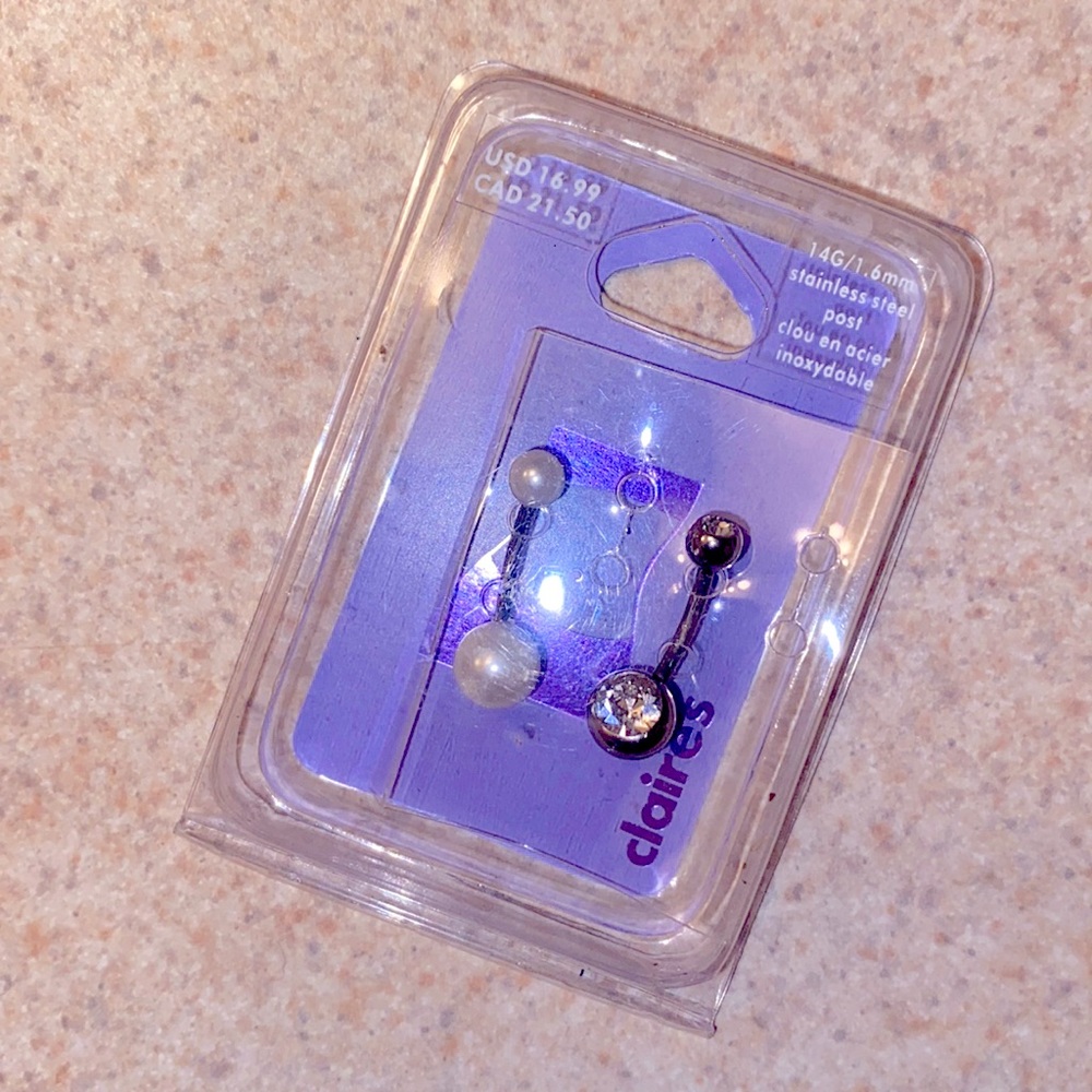 Belly button ring. Never used. Still in packet.